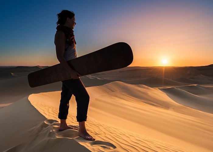 Sandboarding on the Merzouga dunes
